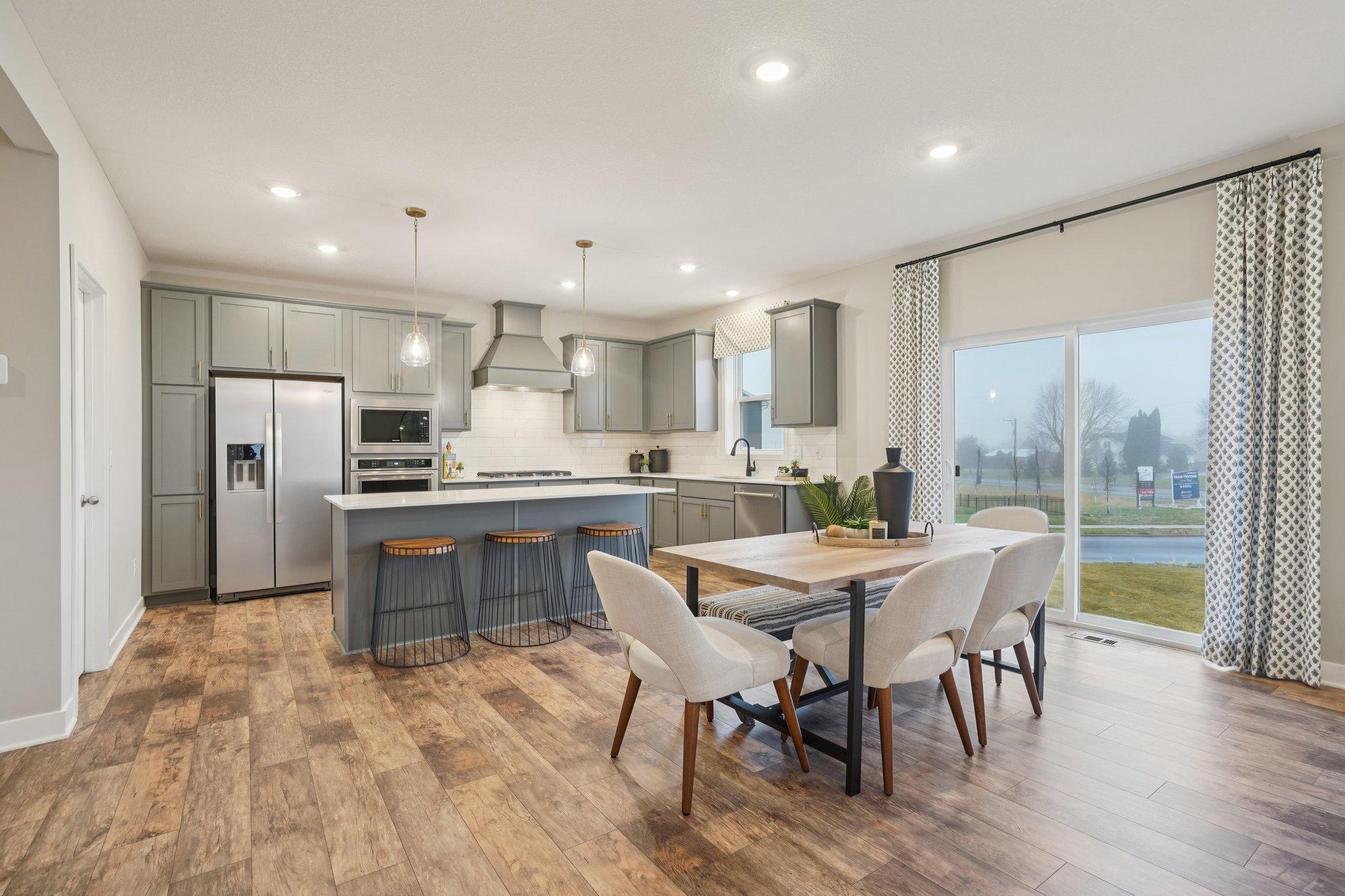 Another look at the kitchen, which is loaded with the perfect combination of function and beauty!! Photo of model home, color and options will vary.