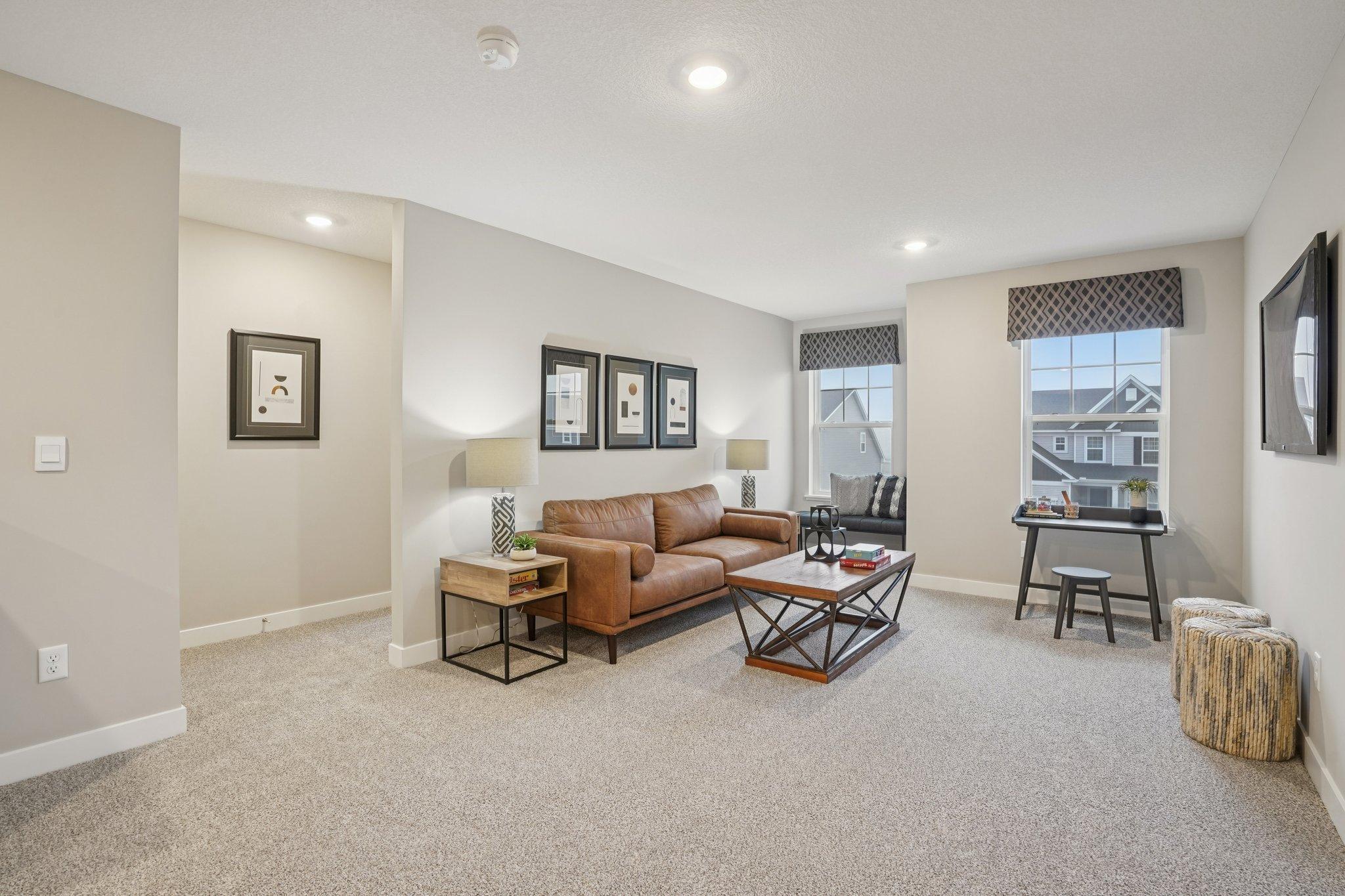 Spacious loft area. Photo of model home, color and options will vary.