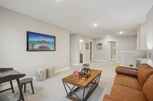 Spacious loft area. Photo of model home, color and options will vary.