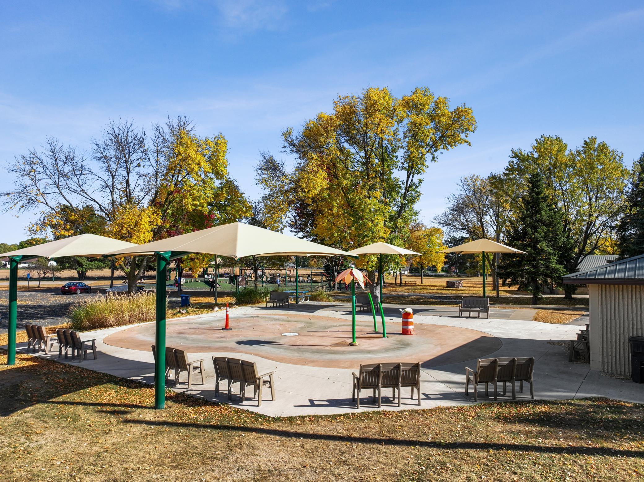 Lions Park is a 50-acre park with splash pad, basketball court, playground, tennis and pickleball courts, hockey rink and skating area.