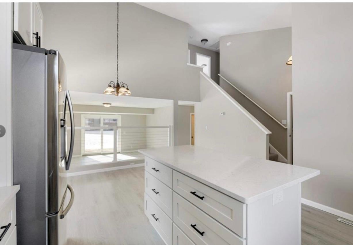 Soaring ceilings, open concept, and an abundance of natural light!