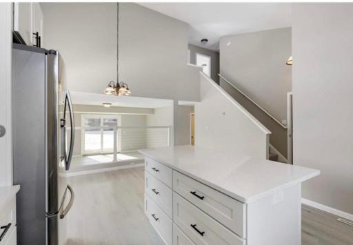 Soaring ceilings, open concept, and an abundance of natural light!