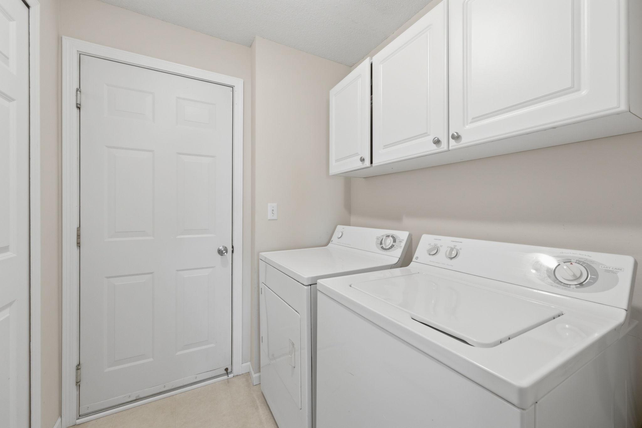 Mudroom entrance from garage with laundry