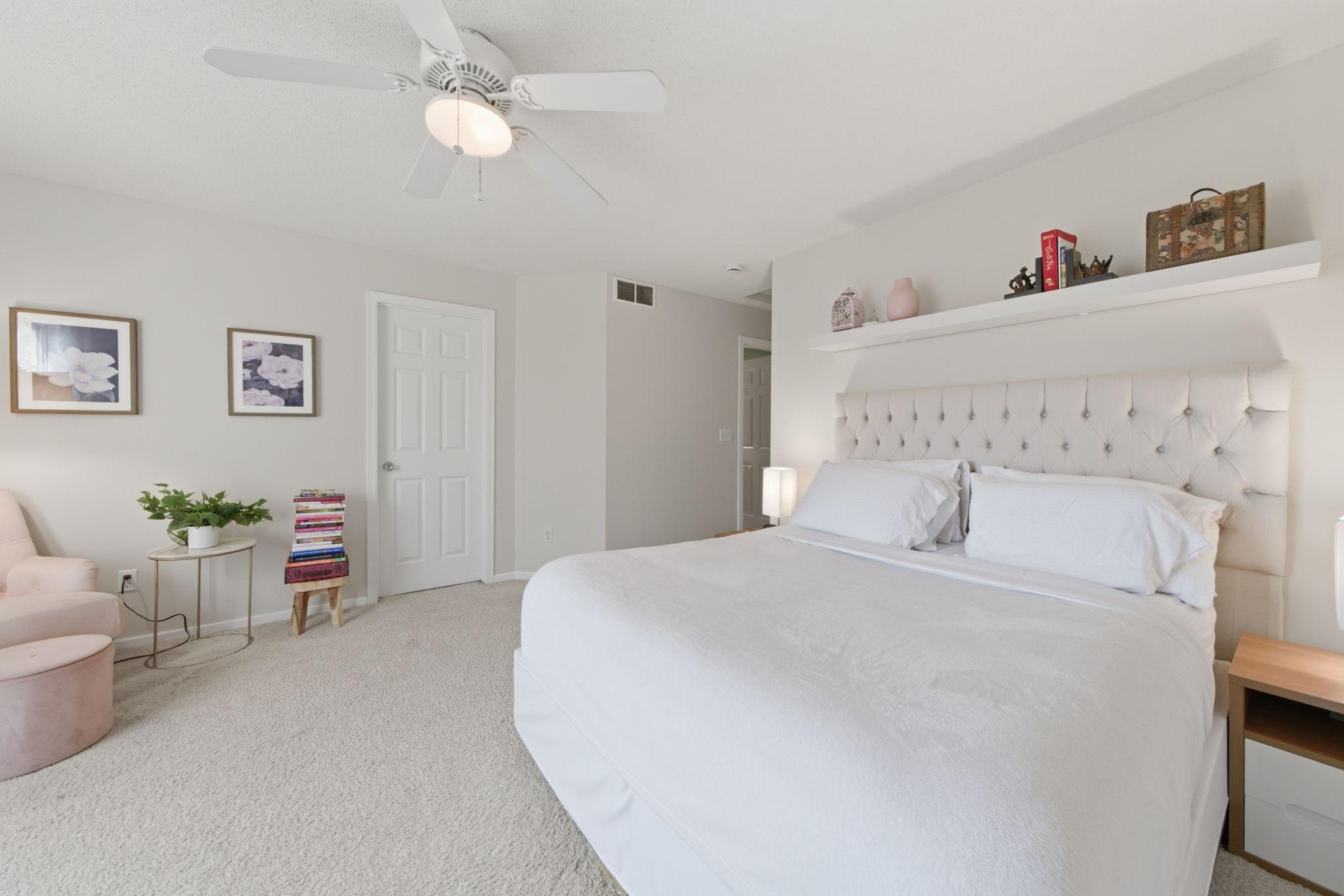 Spacious primary bedroom with walk in closet