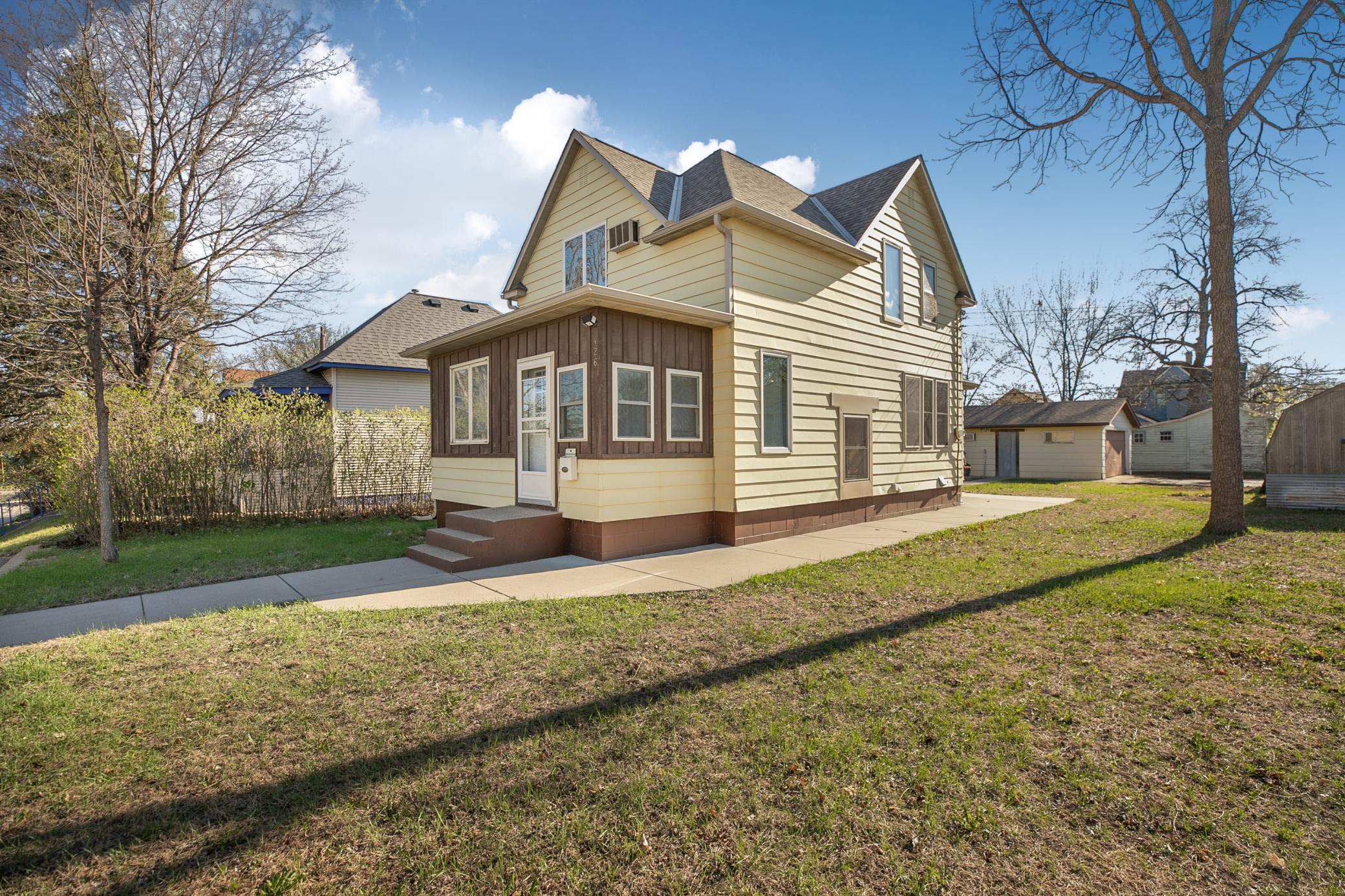 Wrapped in durable aluminum siding and complemented by rain gutters, the house offers low-maintenance peace of mind.