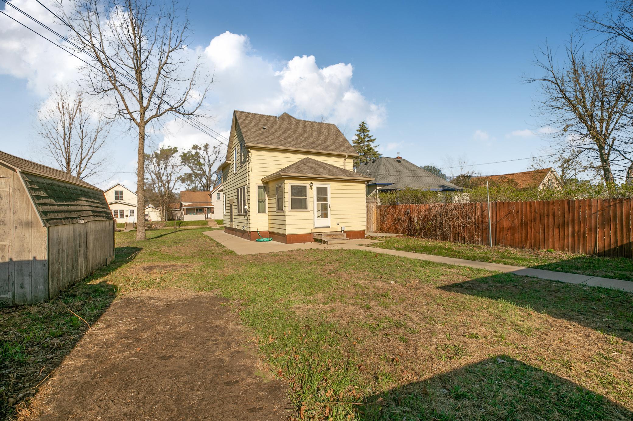 Solid concrete sidewalk from the detached garage to the house.