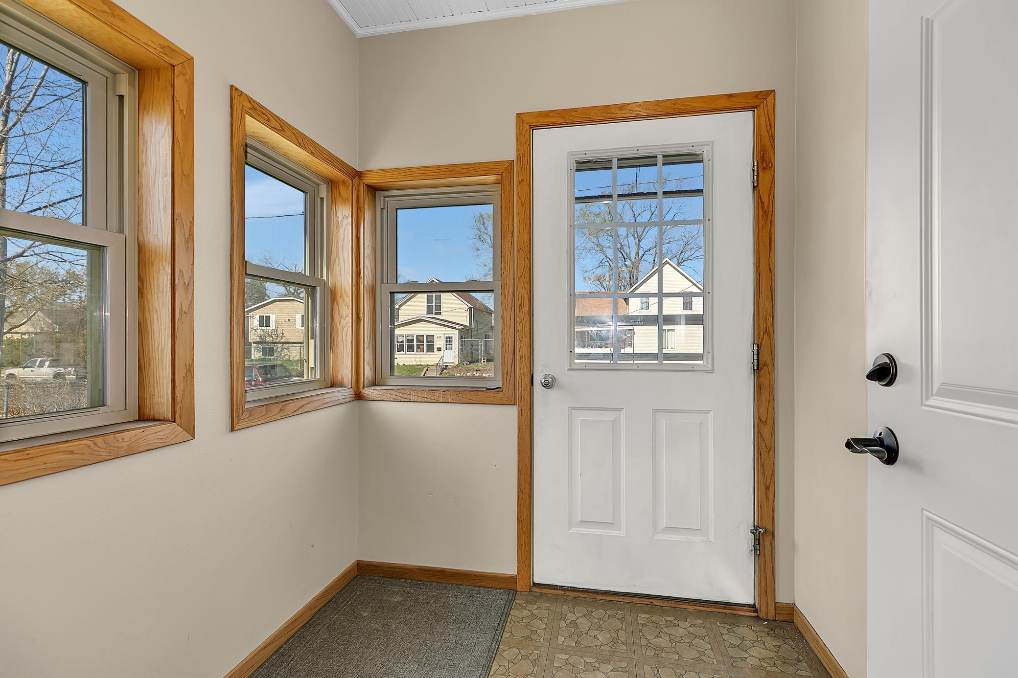 Front entry porch with room for a bench.