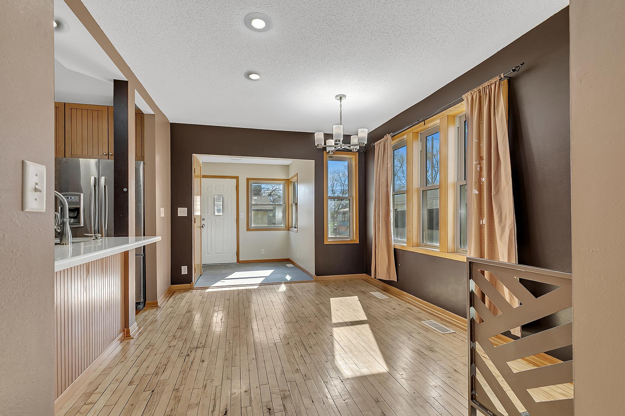 Convenience continues with a main-level half bath just off the back entrance.