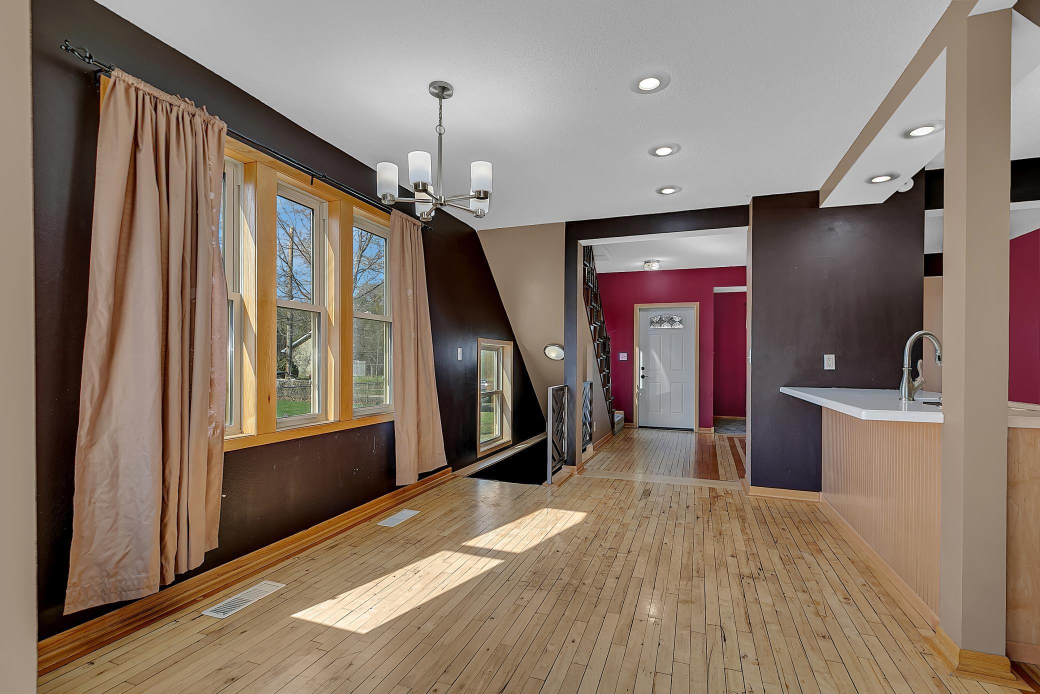 Large windows in the dining room provide natural lighting as well.