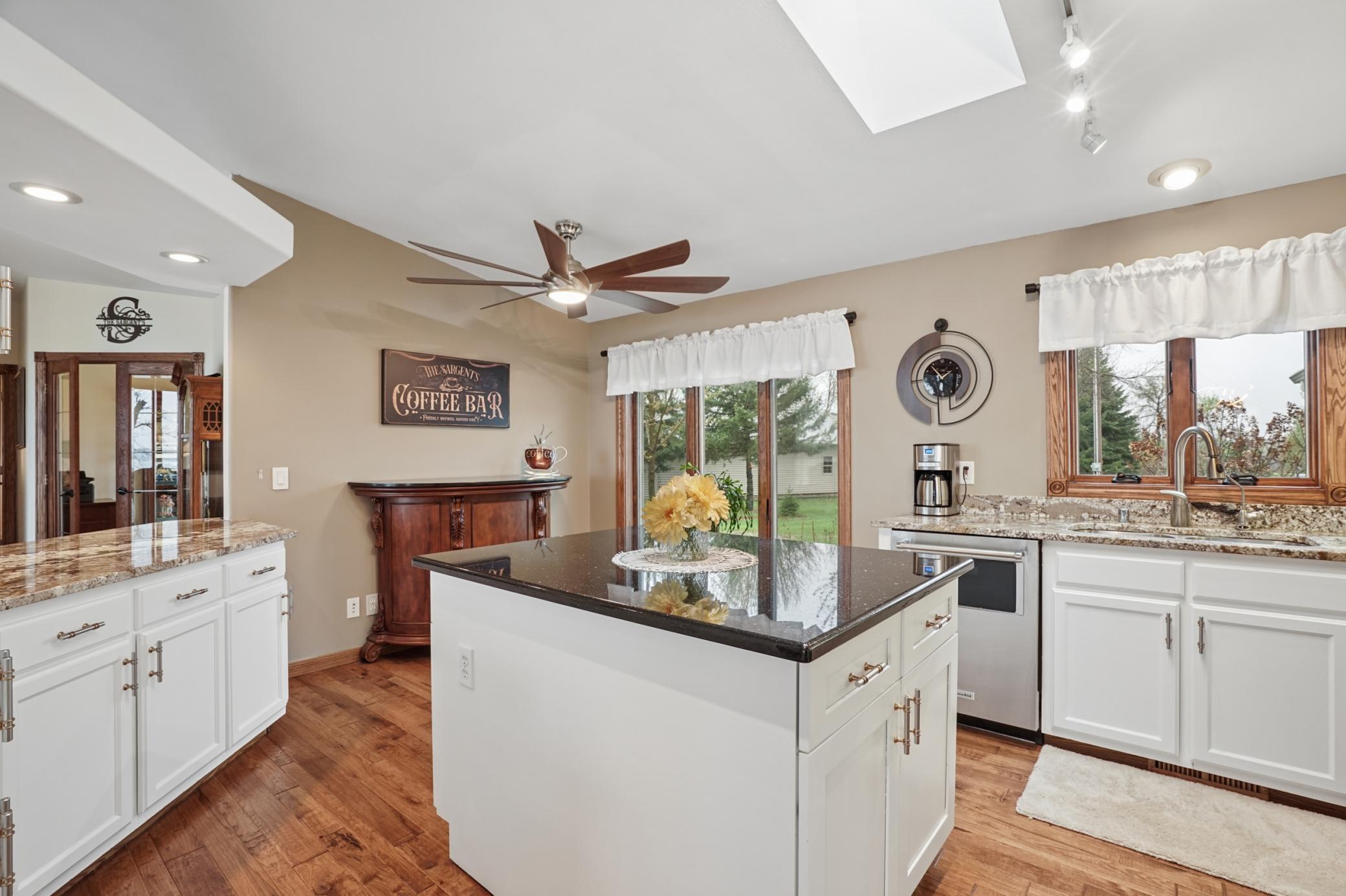 Beautiful Georgia Hickory hardwood floors are featured in the kitchen.