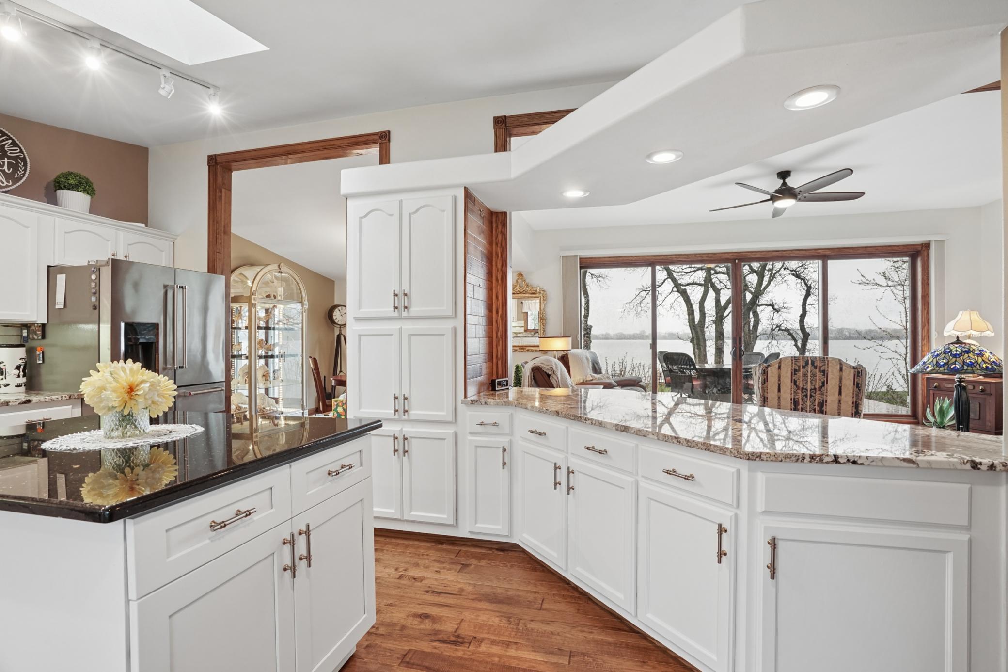 Additional seating can be found at the counter. Enjoy views of Lake Preston from your kitchen!