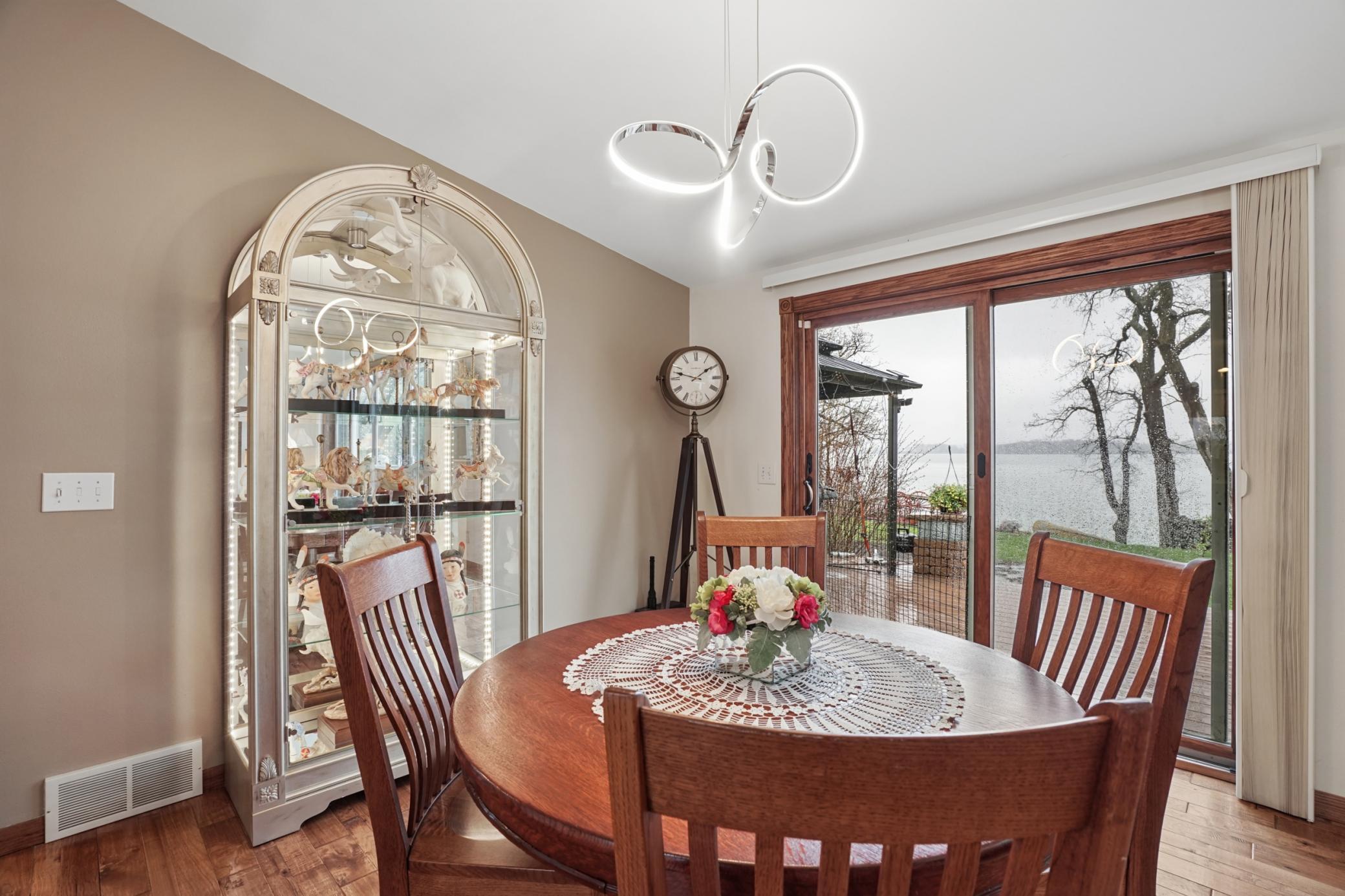 An additional patio door off of the dining room provides even more access to the maintenance free deck.