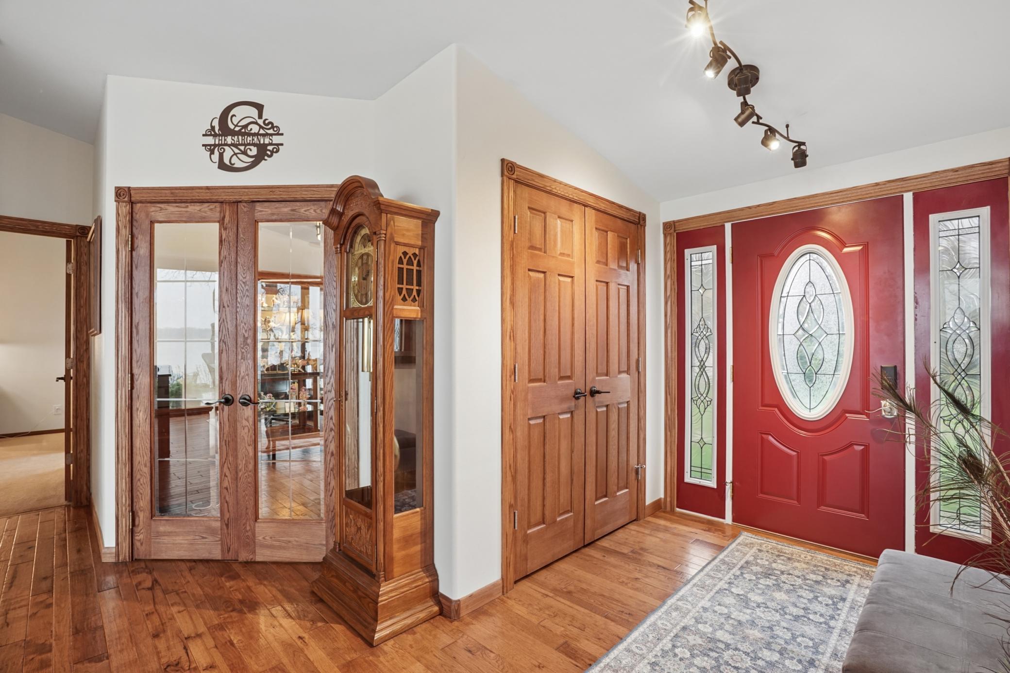 The dedicated office features beautiful French doors. Beautiful Georgia Hickory hardwood flooring is featured throughout the main floor.