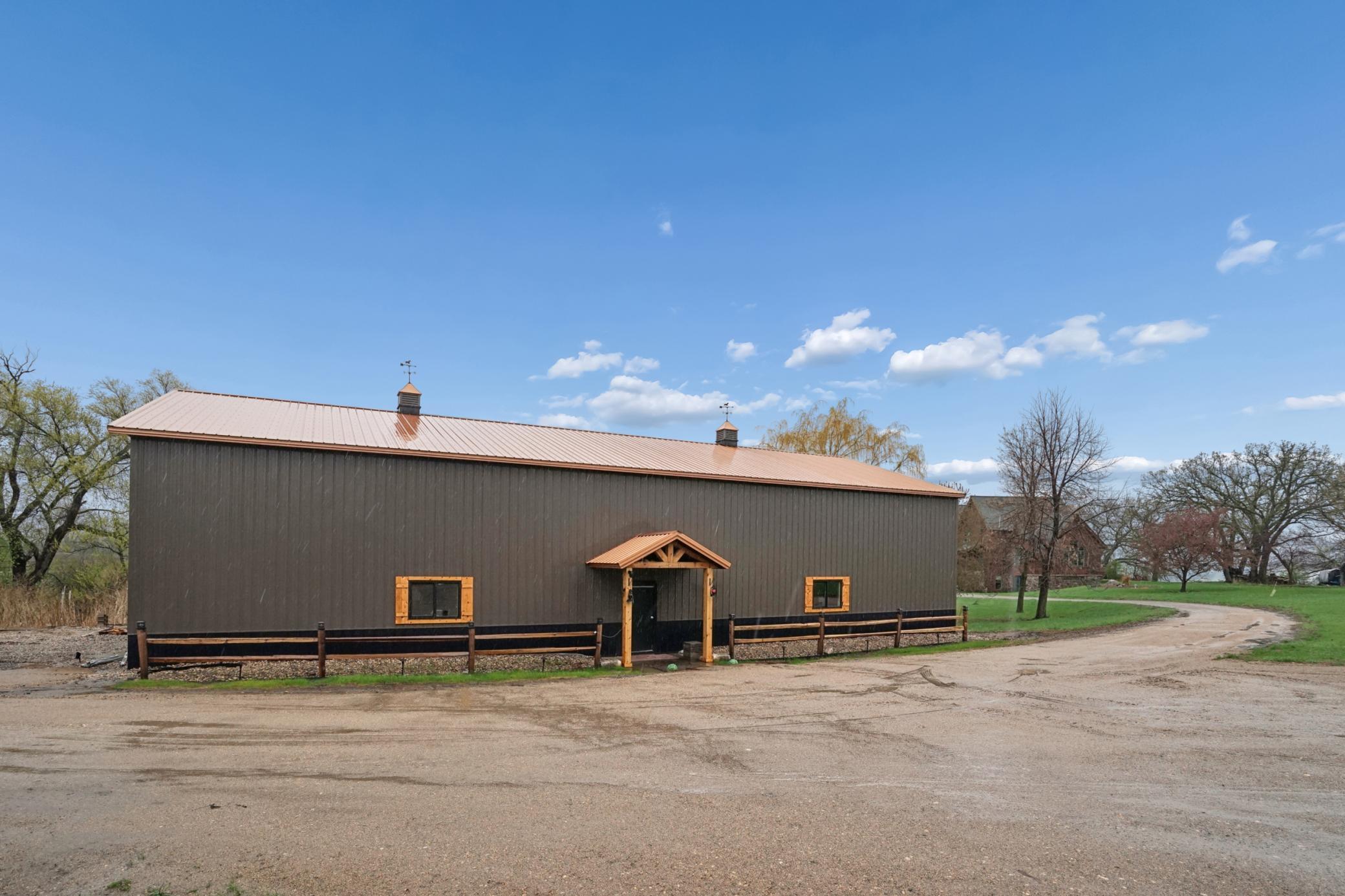 The 80'x40' Ram pole shed was new in 2025. A 14'x14' overhead door is included.
