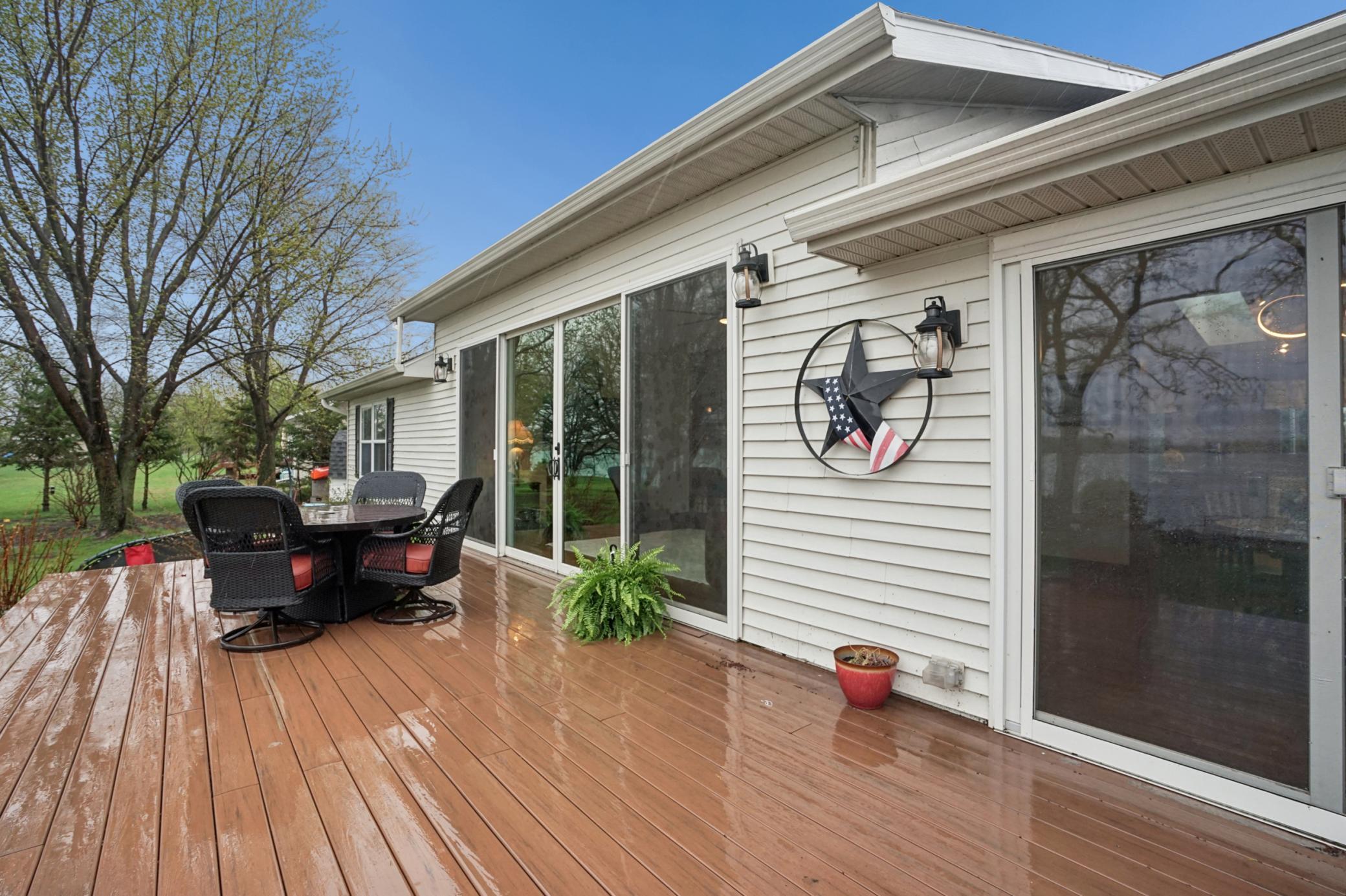 9'x18' Anderson patio doors seamlessly connect the interior to the maintenance-free deck.