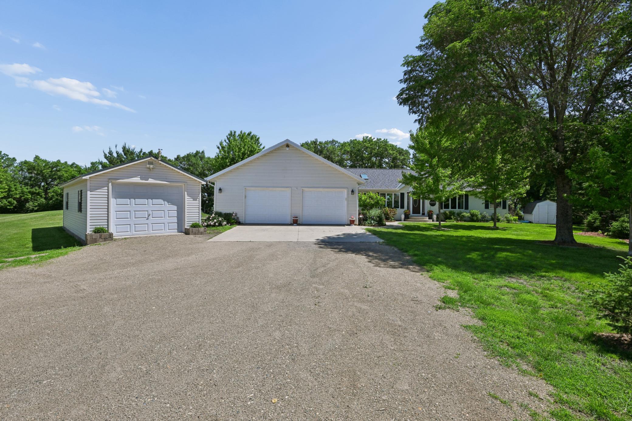 The attached oversized 2 stall garage is heated, insulated, and features 100 amp power. The detached garage was new in 2022.