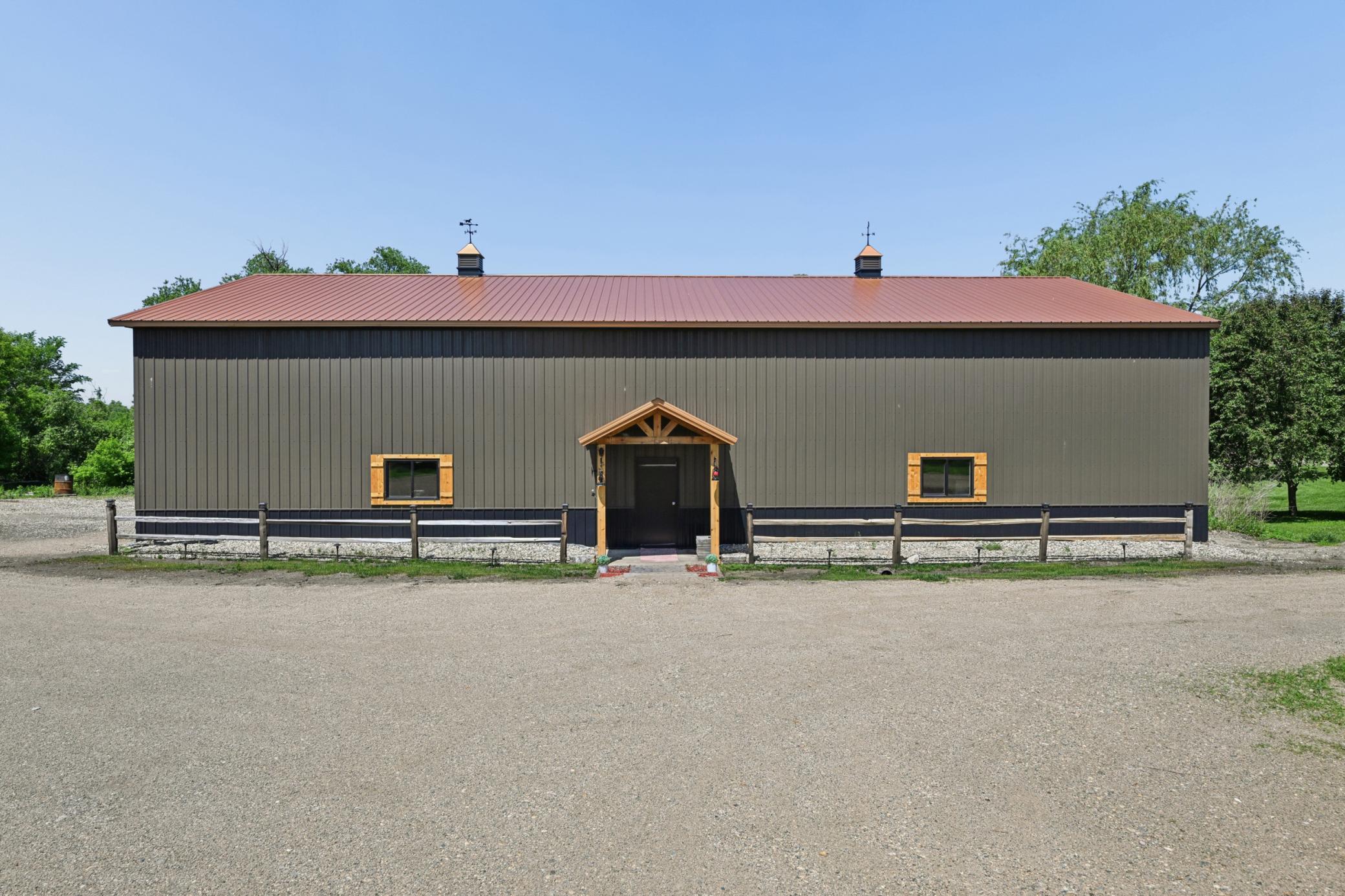 The 80'x40' Ram pole shed was new in 2025. A 14'x14' overhead door is included.