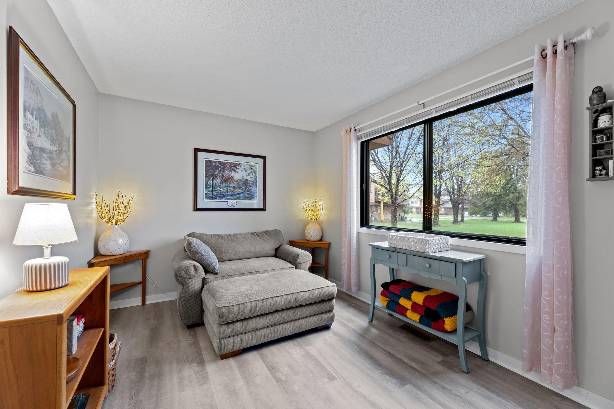 Second bedroom roomy, open and bright.