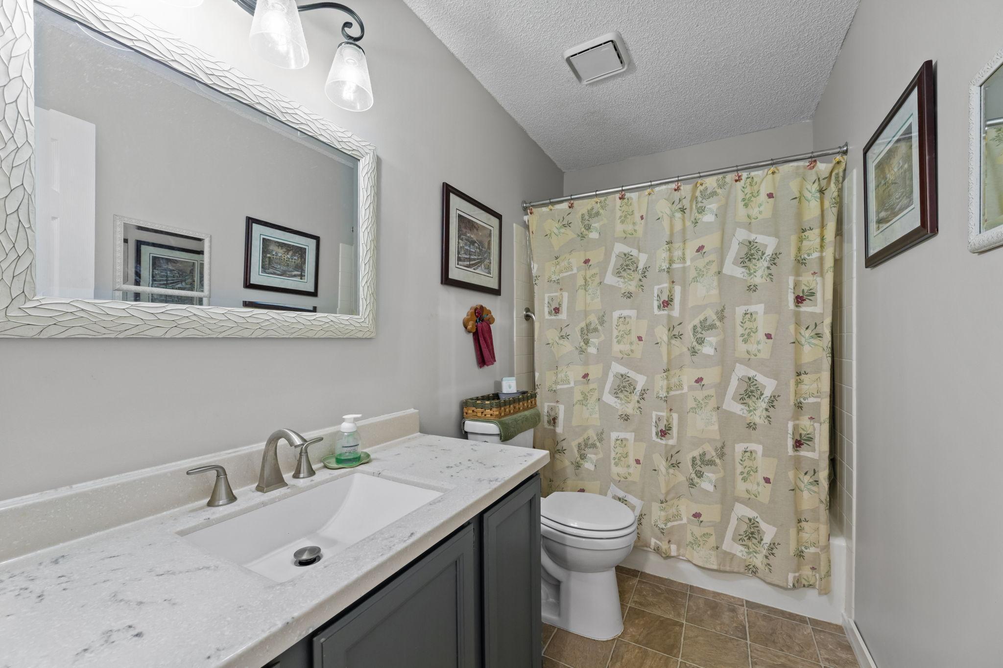 Updated spa like full bathroom.