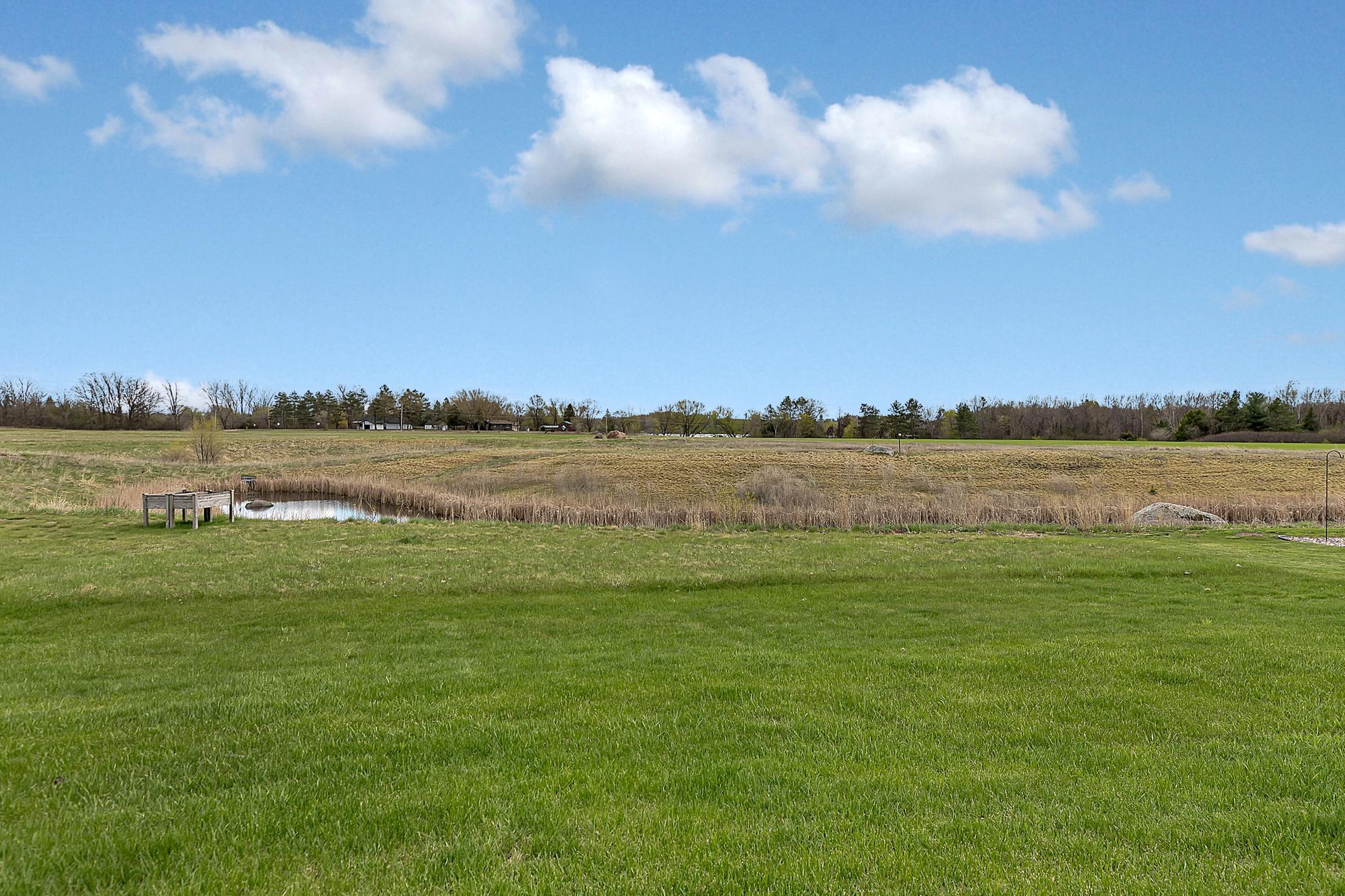 An in-ground sprinkler system keeps the lawn looking lush and fresh all summer long.