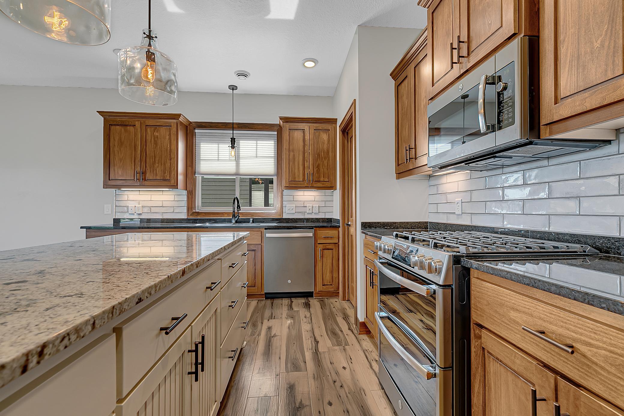 Stainless steel appliances. A double oven and newer dishwasher make entertaining and daily living effortless.