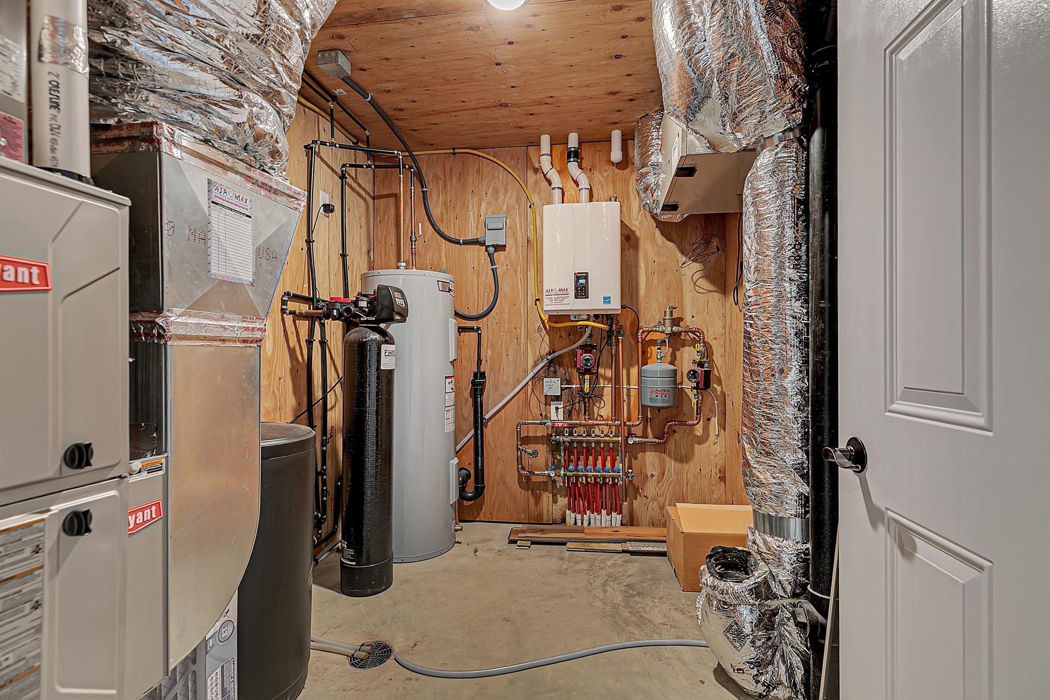 Mechanicals include a high-efficiency Bryant furnace, central air, owned water softener, on-demand water heater, and heat recovery ventilator.