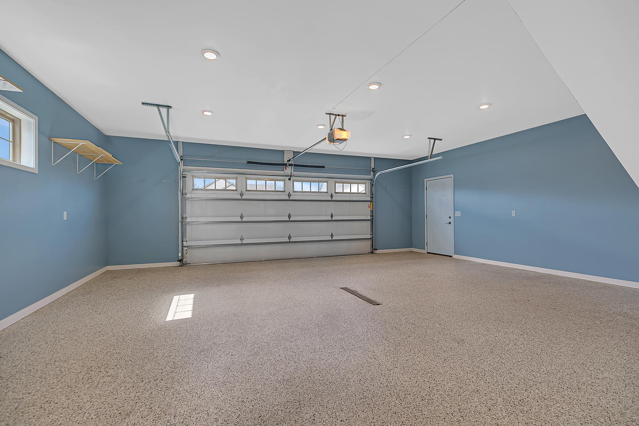Epoxy floors, floor drain, Wi-Fi opener, and side service door.