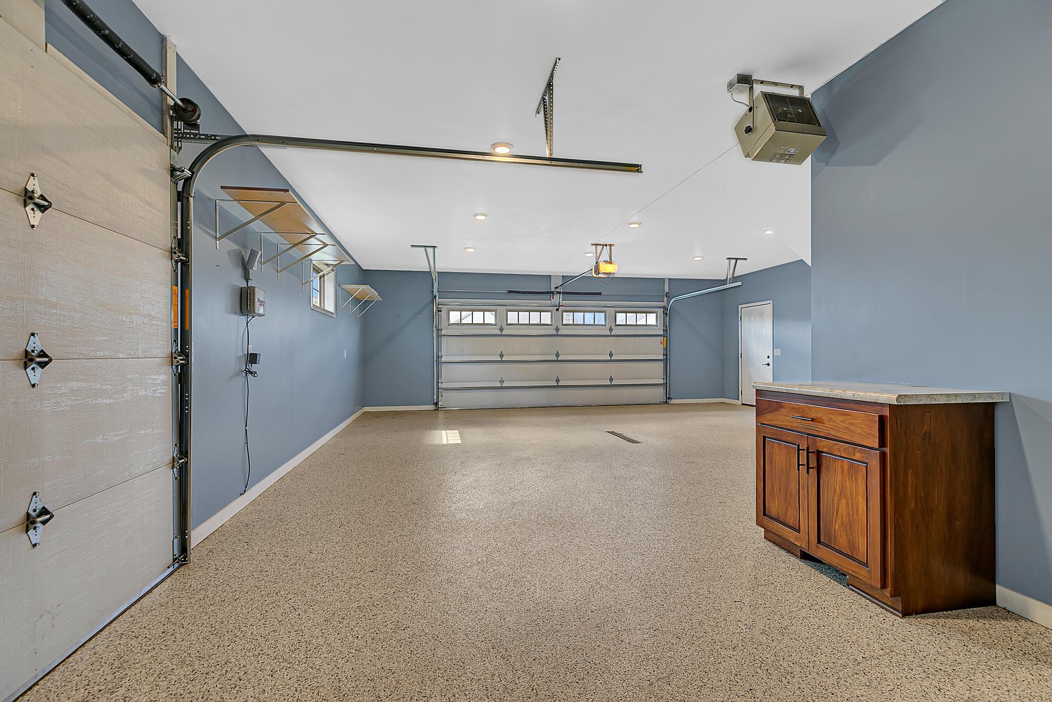 Additional side overhead door—perfect for a lawn mower or golf cart.