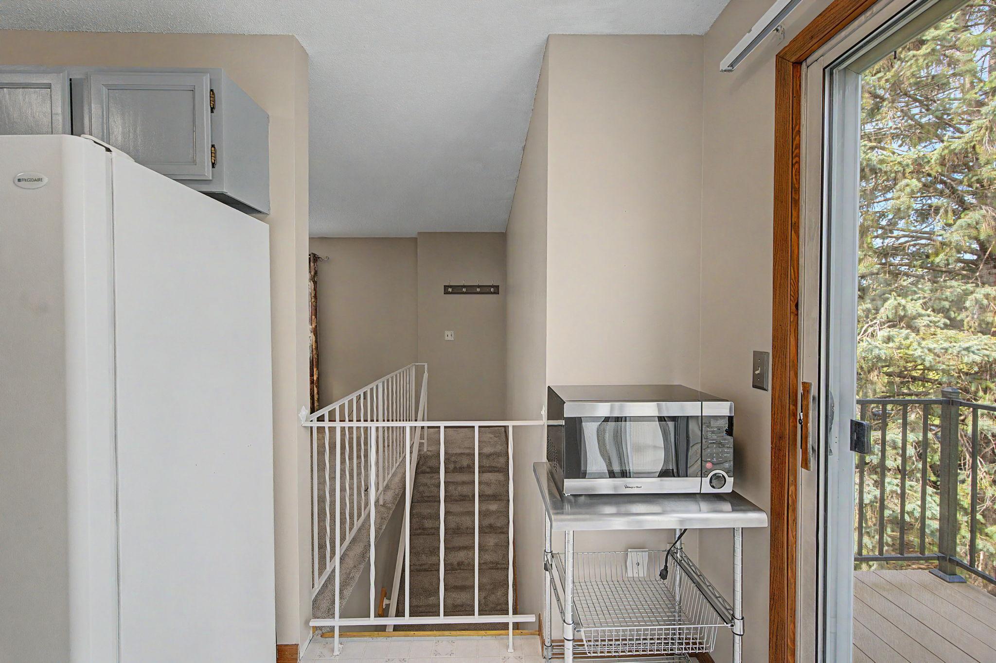 From the kitchen, over the staircase