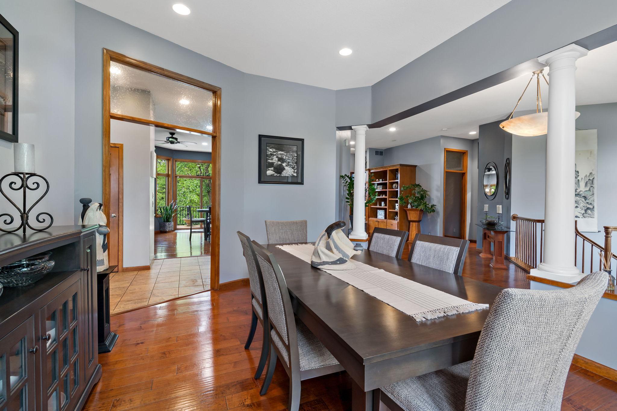 Formal dining area flows between large foyer and entrance into the kitchen.