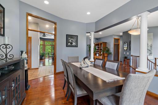 Formal dining area flows between large foyer and entrance into the kitchen.