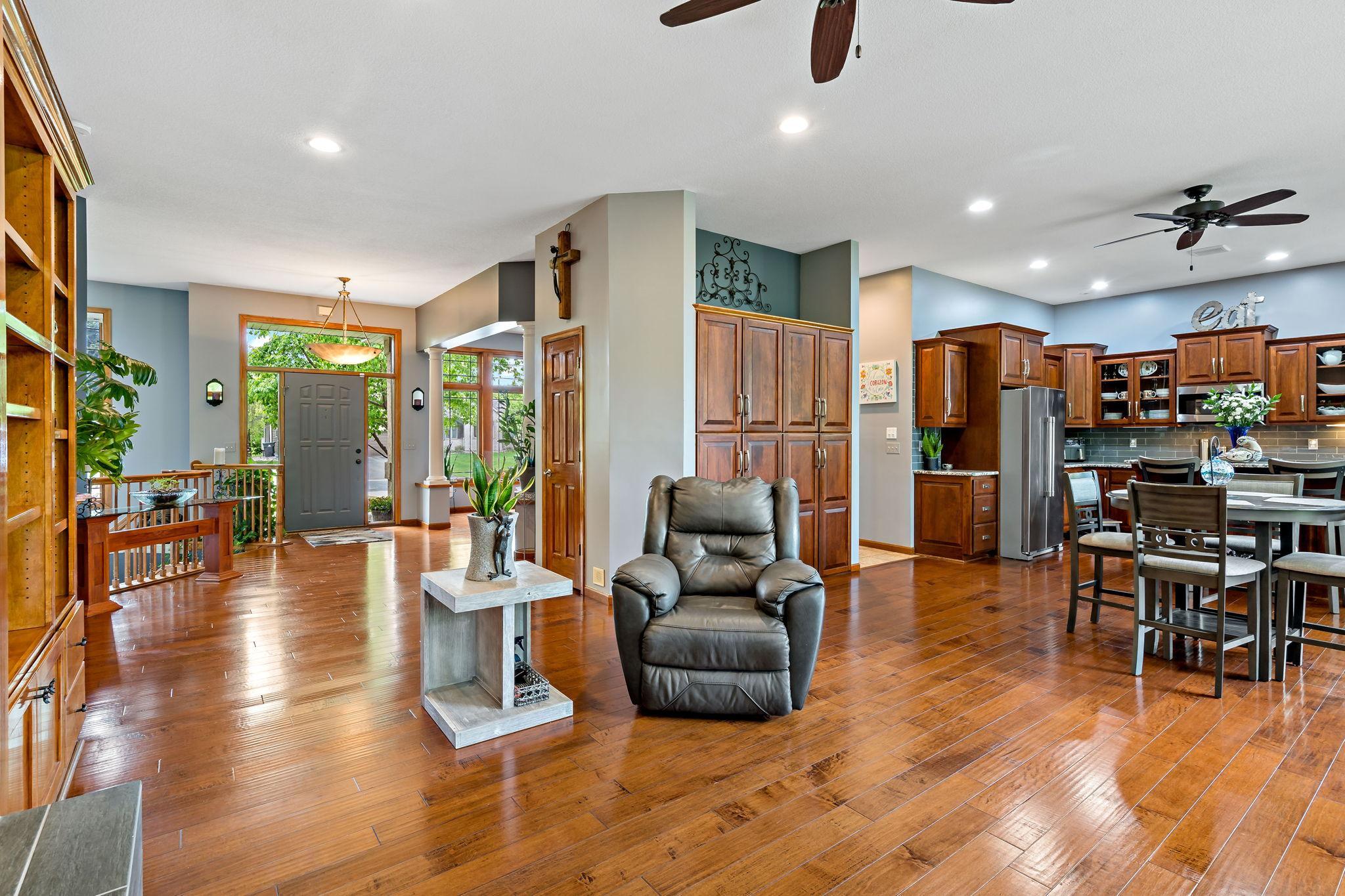 Spacious family room blends into the informal dining area and kitchen seamlessly.