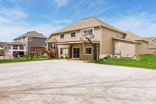 Imagine the hours of fun you'll have in this backyard. Basketball, Pickleball, bike riding and chalk drawing are a few suggestions from the current owners.