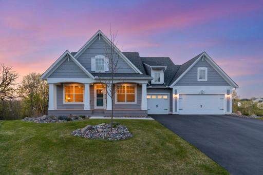Perfectly nestled on 0.78 breathtaking acres in the highly sought-after Harvest West community in beautiful Chaska, this stunning custom-built masterpiece by Robert Thomas Homes offers luxury one-level living at its finest.