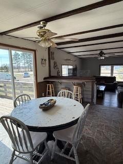 Open to living room, dining patio door leads to the back deck