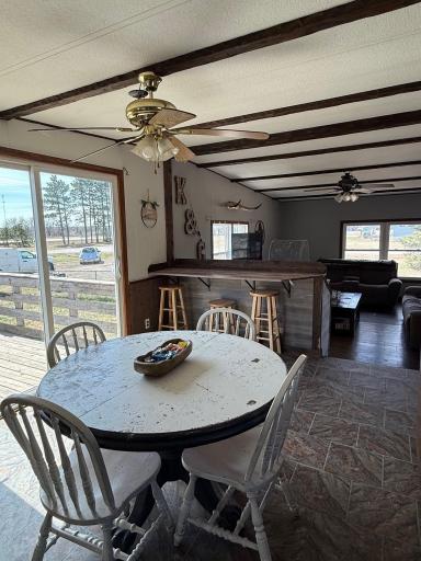 Open to living room & patio door to back deck