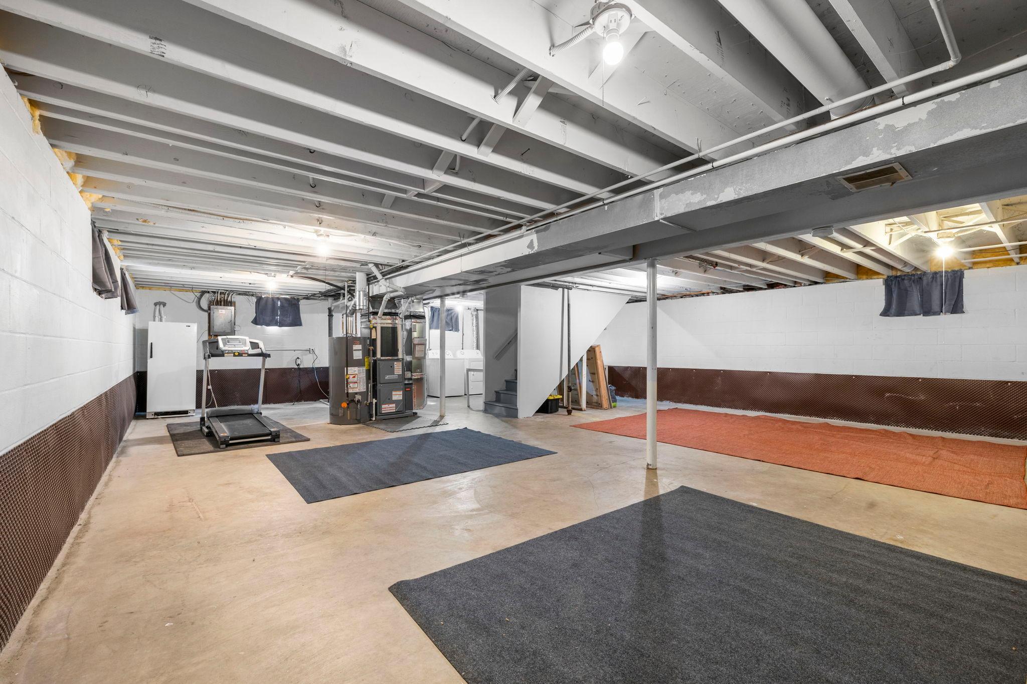 Spacious unfinished basement with drain tile system