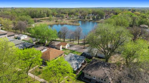 Welcome to 5116 Vincent Ave N with pond views