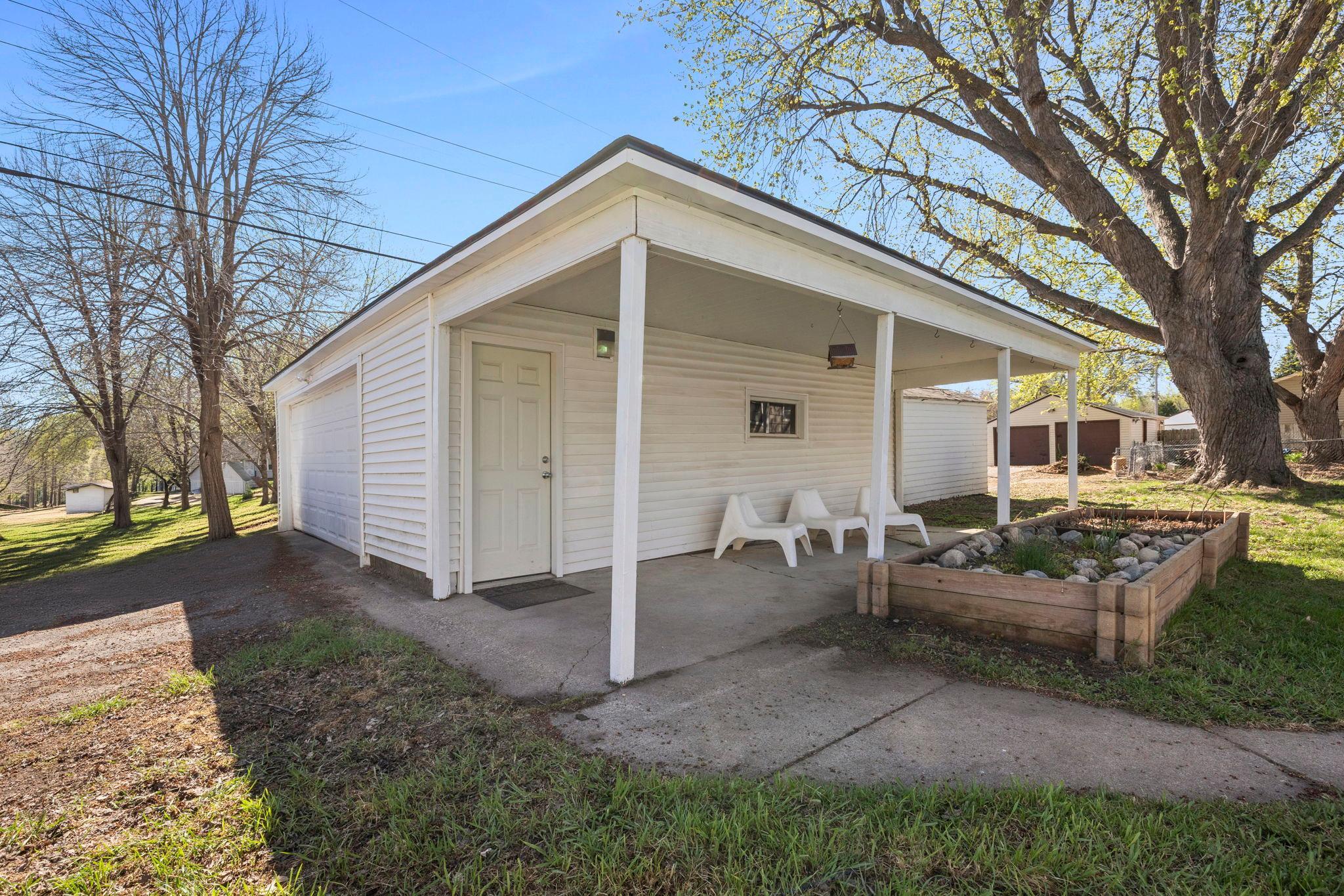 Two stall garage with carport
