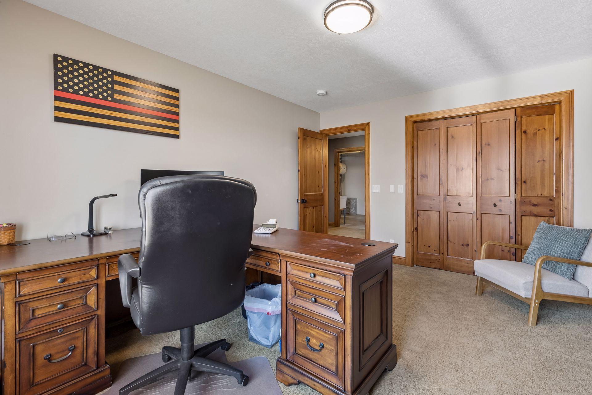 Lower level bedroom used as office.