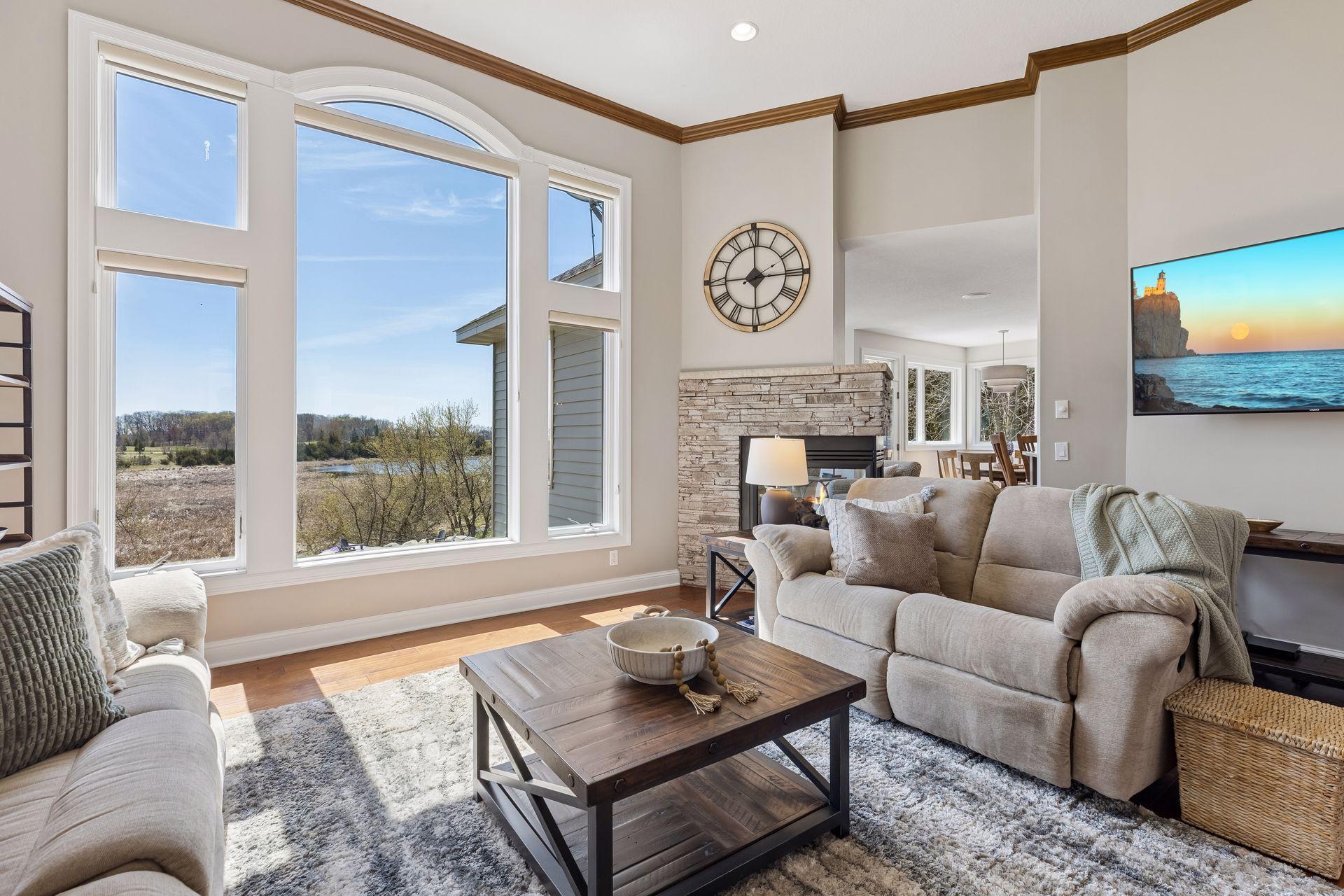 Oversized window with views of Marsh and Scott Lake