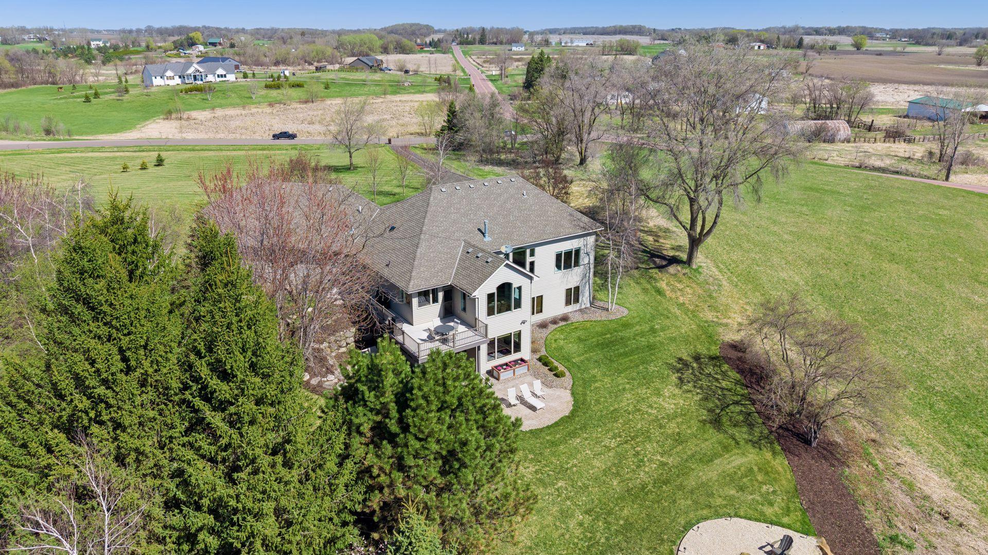 Tall pines separate the property