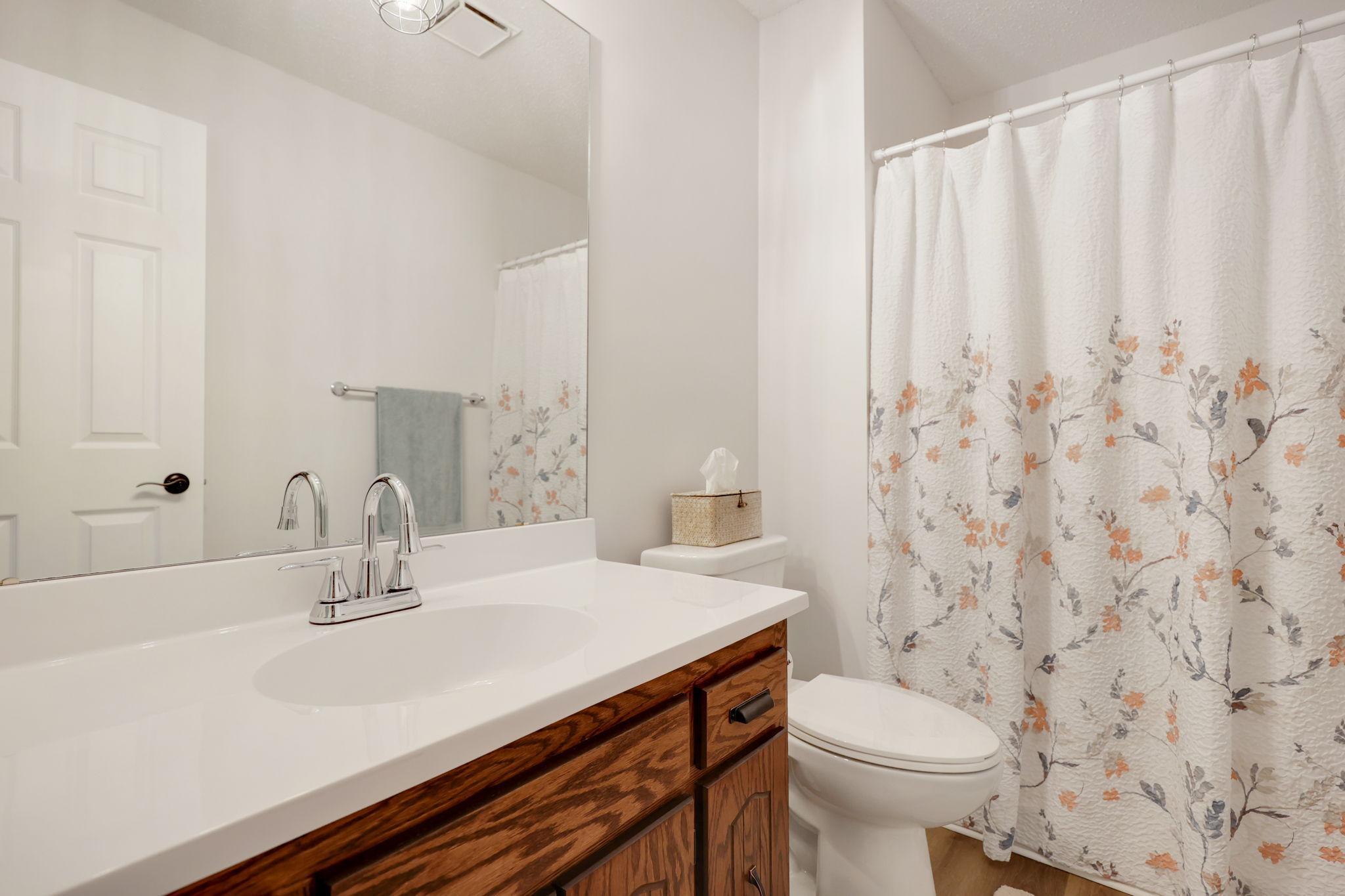 Primary ensuite new counters, flooring, toilet, lighting and fixtures.