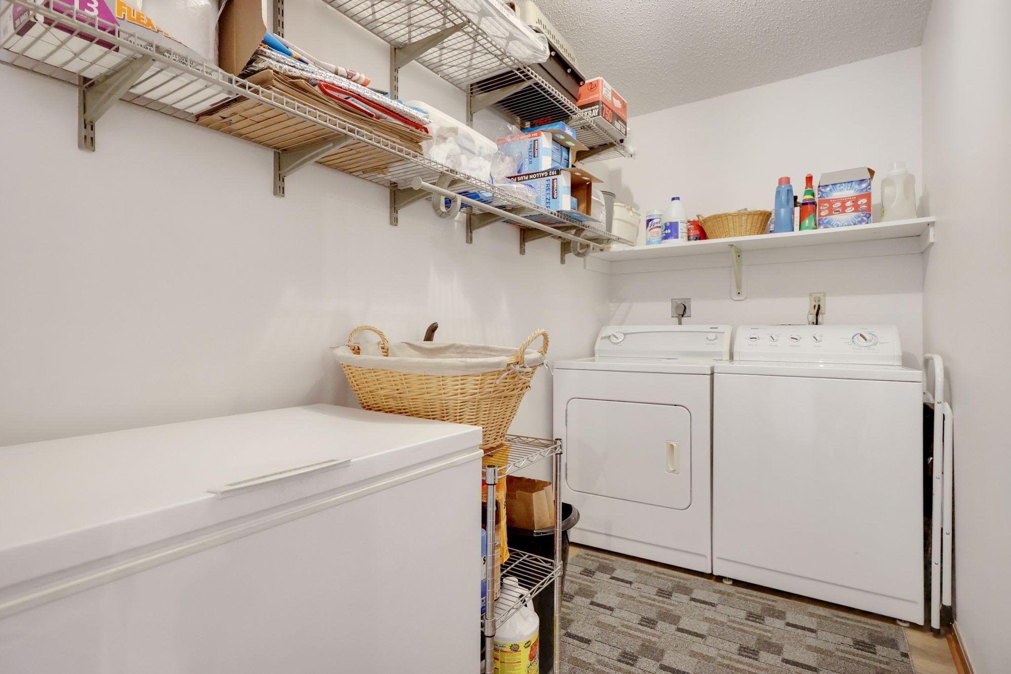 Laundry room with room for a feezer.