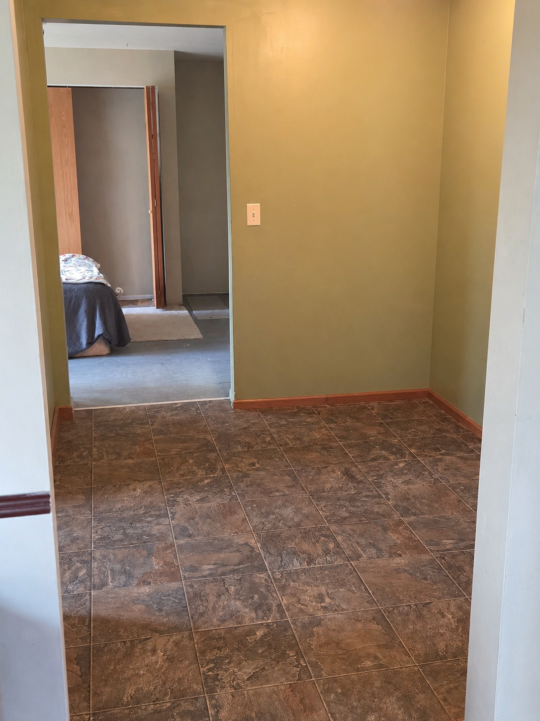 Hallway leading to bedroom on main floor.png