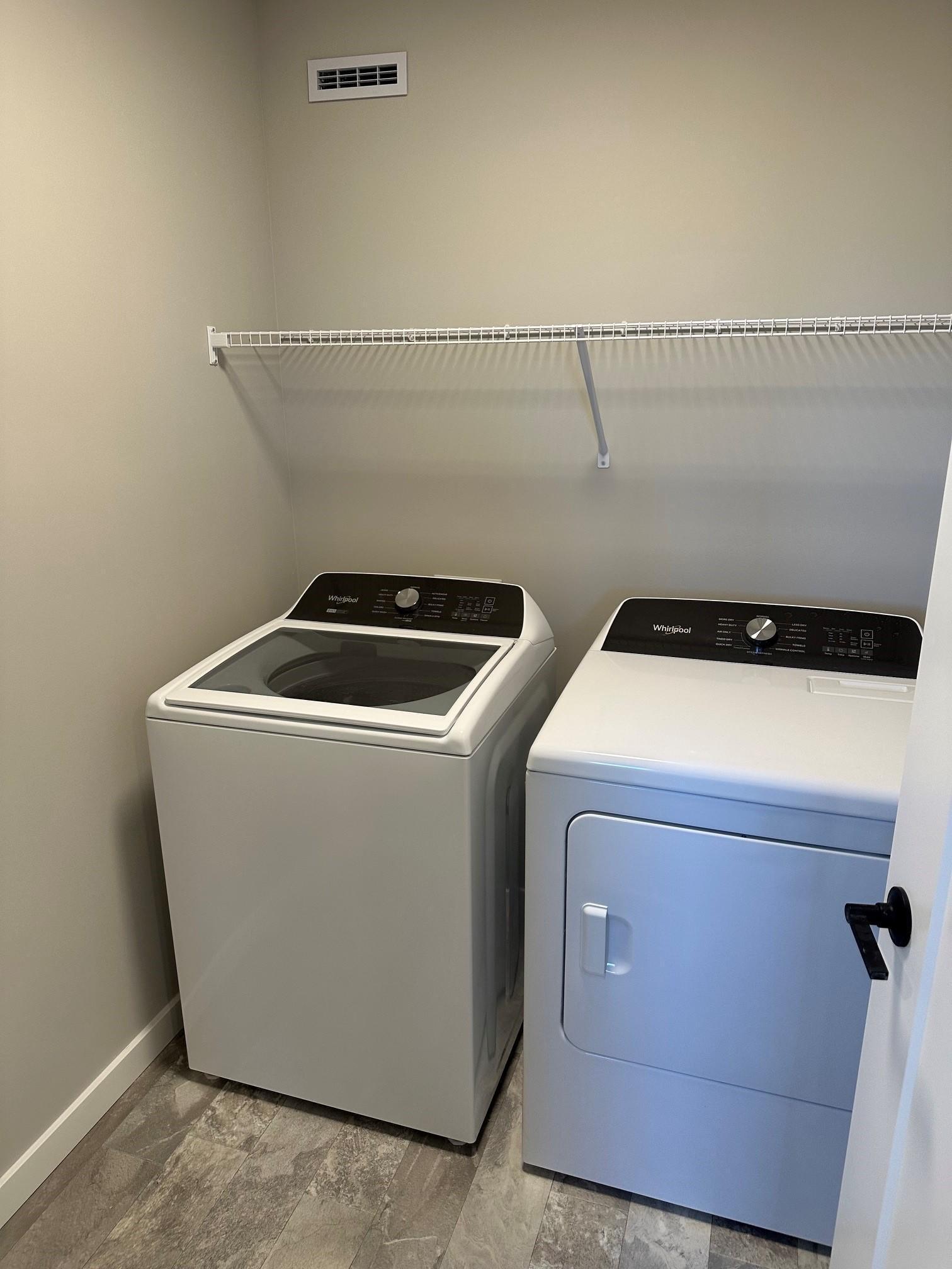 The second floor laundry includes the washer and dryer!.jpg