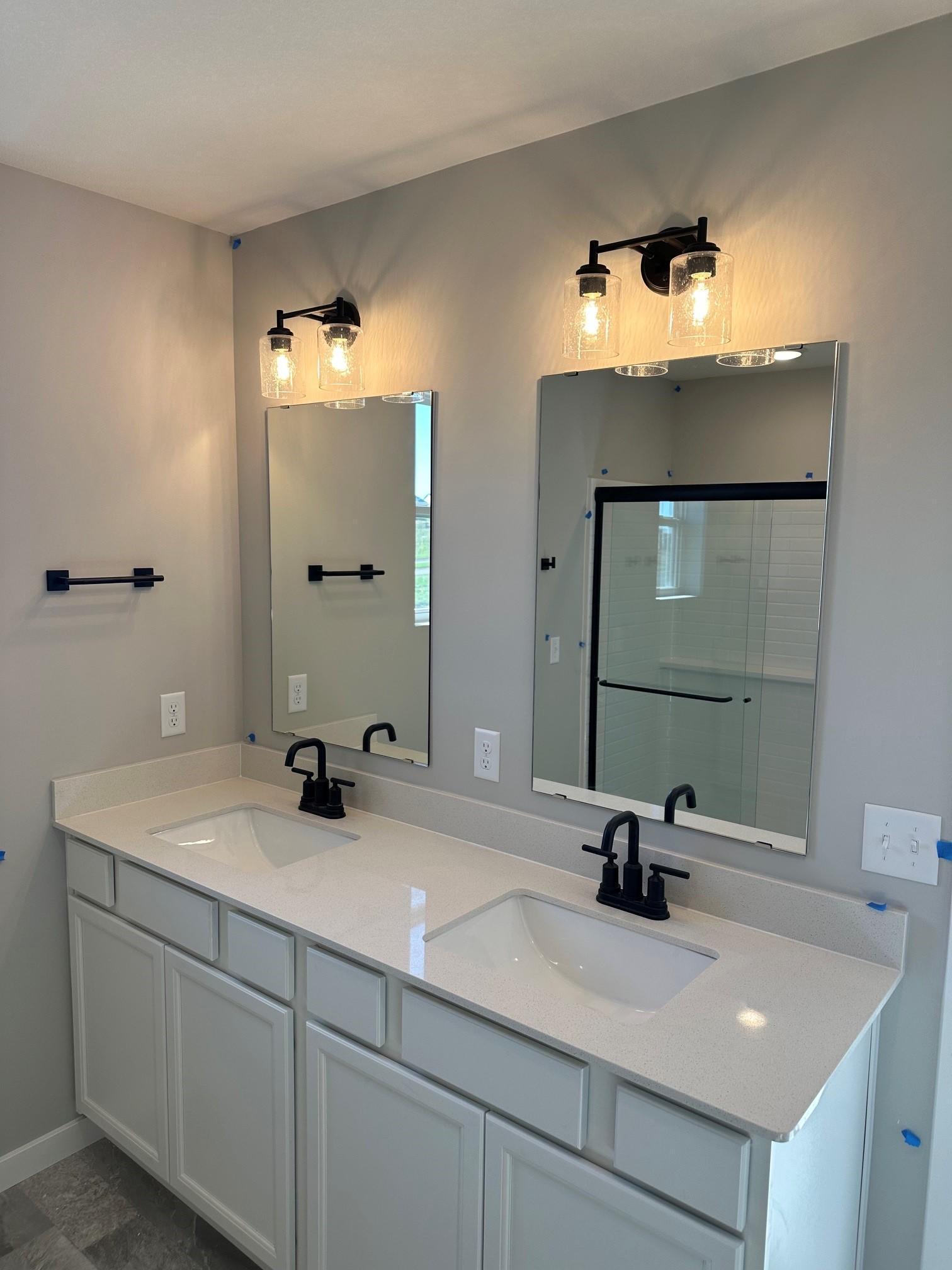 Two Sinks in primary bath, along with a window!.jpg