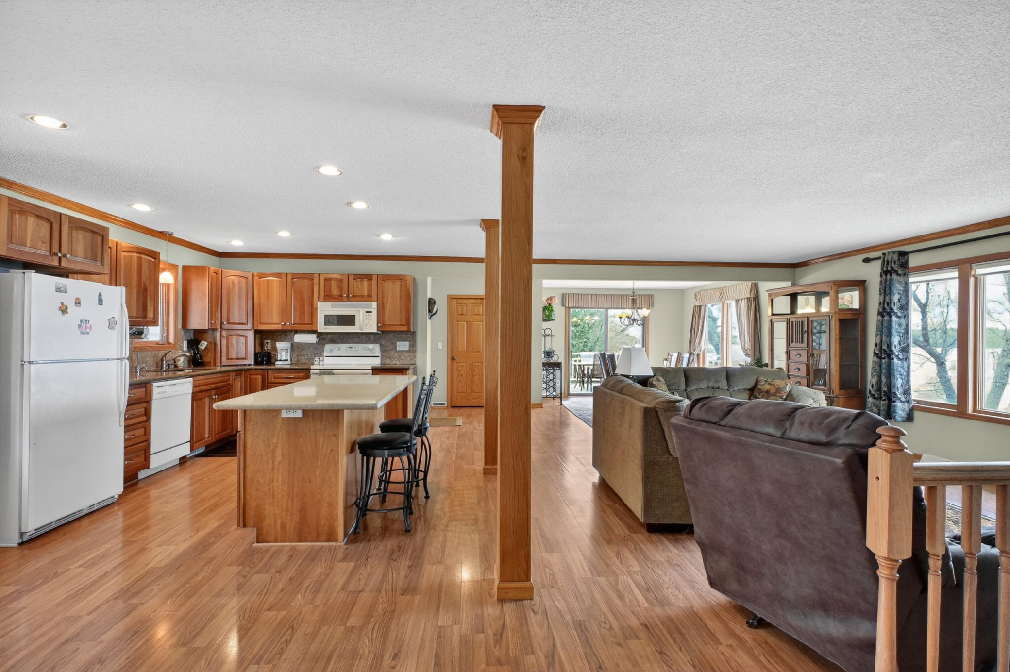 Cherry kitchen with Cambria countertops on the perimeter