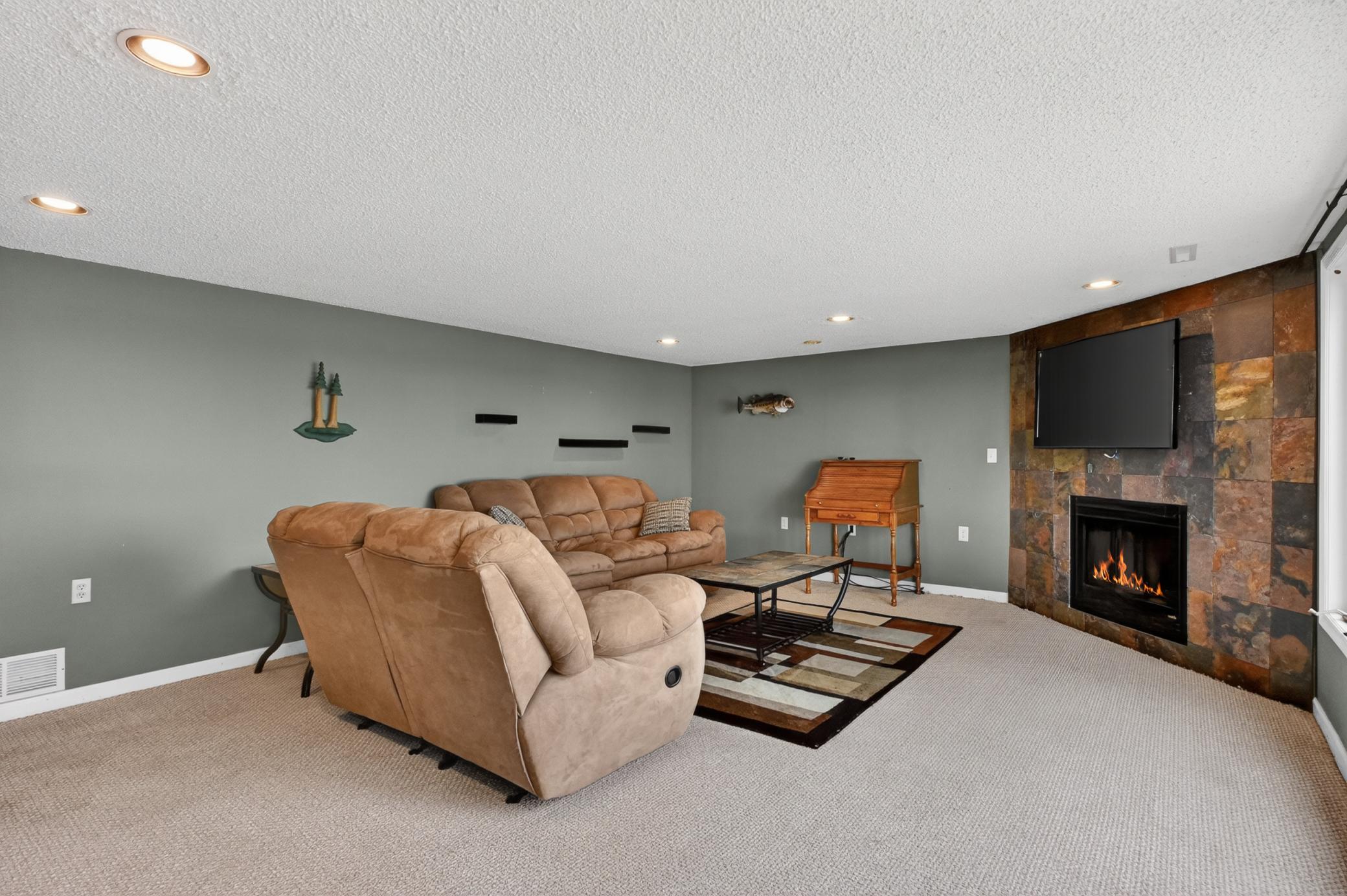 Lakeside family room with gas fireplace