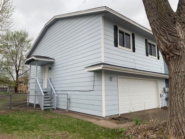 Freshly painted exterior and new garage door